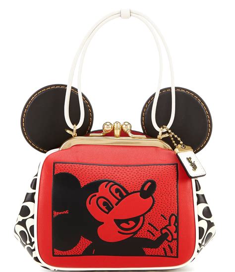 Screen art on coated cotton. . Coach mickey mouse crossbody bag